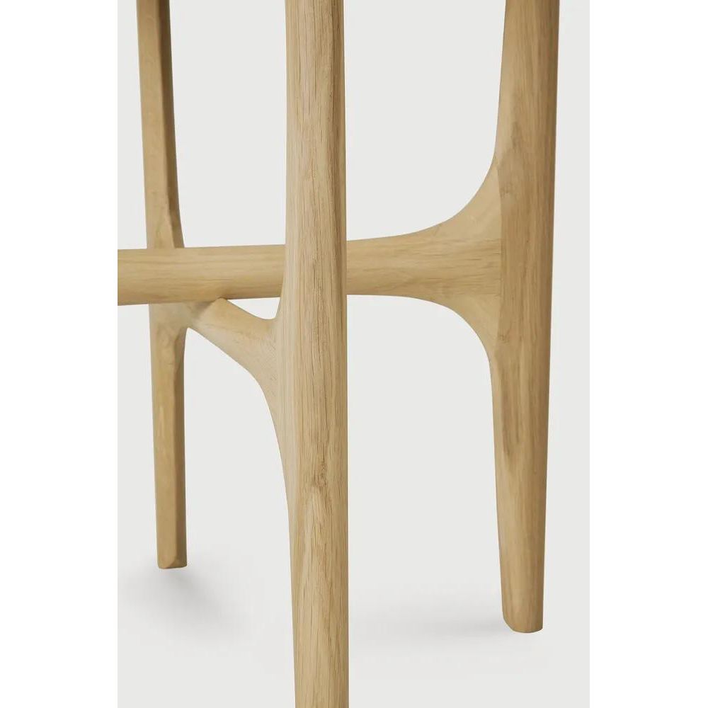 Featuring PI Side Table by Ethnicraft at Amethyst Home. The PI collection honors nature’s design, by keeping the strength, curves, and lines, as nature intended. Interesting shapes are discovered in this sleek and stylish, polished imperfect, finish. Each PI side table is finished by hand to ensure that the individual character of the wood is respected. Des. Amethyst Home provides interior design, new home construction design consulting, vintage area rugs, and lighting in the San Diego metro area.