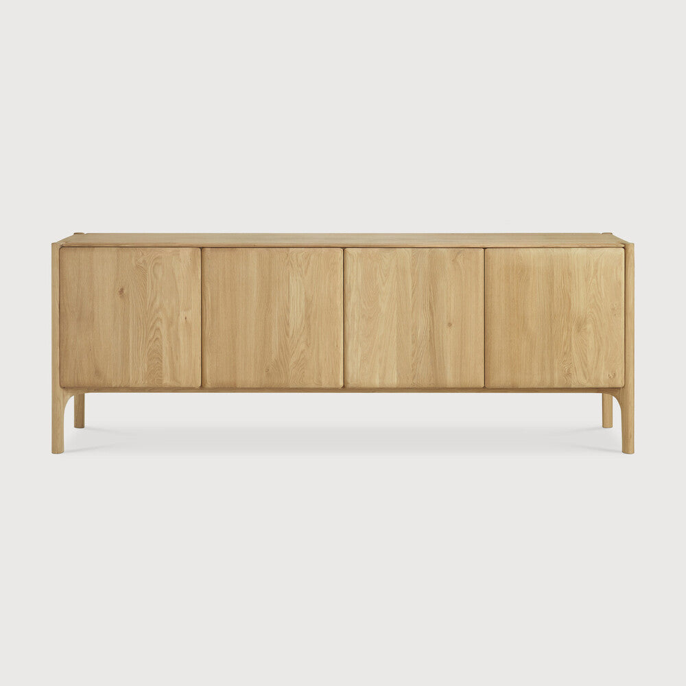 Featuring PI Sideboard Oak by Ethnicraft at Amethyst Home. The PI collection honours nature’s design by keeping the strength, curves and lines, as nature intended. Interesting shapes are discovered in this sleek and stylish, polished imperfect, finish. Each PI item is finished by hand to ensure that the individual character of the wood is respected. The PI. Amethyst Home provides interior design, new home construction design consulting, vintage area rugs, and lighting in the Des Moines metro area.