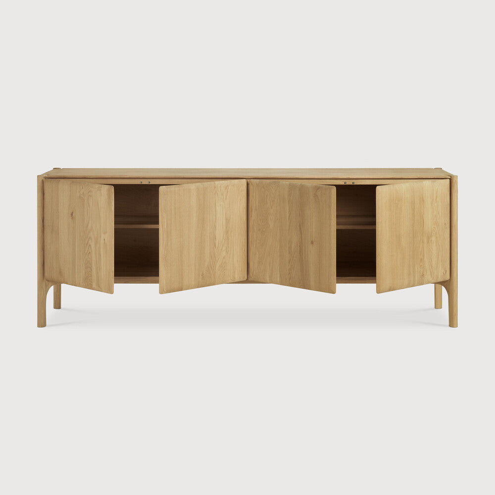 Featuring PI Sideboard Oak by Ethnicraft at Amethyst Home. The PI collection honours nature’s design by keeping the strength, curves and lines, as nature intended. Interesting shapes are discovered in this sleek and stylish, polished imperfect, finish. Each PI item is finished by hand to ensure that the individual character of the wood is respected. The PI si. Amethyst Home provides interior design, new home construction design consulting, vintage area rugs, and lighting in the Seattle metro area.