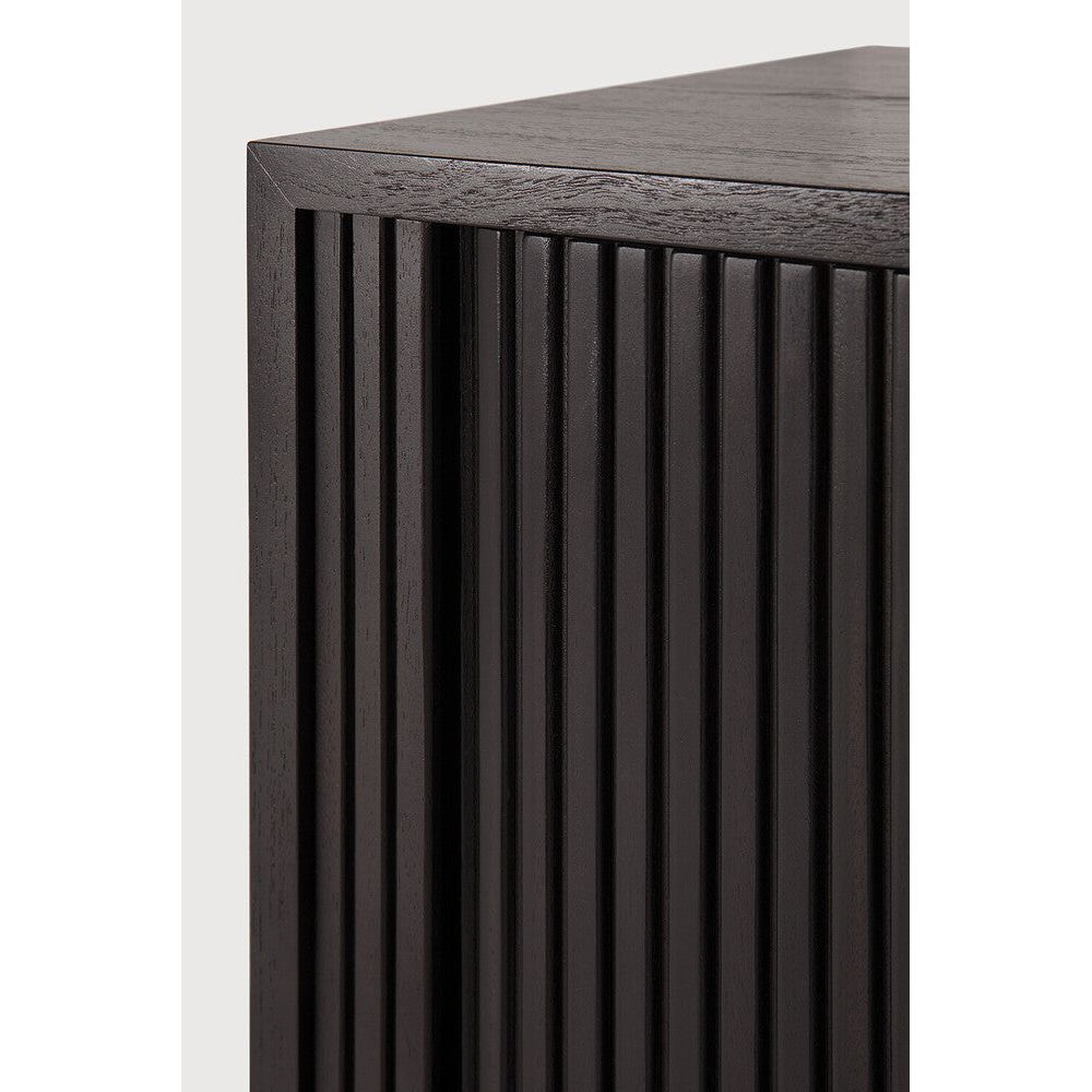 Featuring Roller Max TV Cupboard Teak black by Ethnicraft at Amethyst Home. The Roller Max collection is remarkable in its design, distinguished with its stacked wood-stick effect. The TV cupboard offers functional storage in an eye-catching design, resulting in an elegant and sophisticated item for both residential and commercial spaces.
Overall Dimensions: 18. Amethyst Home provides interior design, new home construction design consulting, vintage area rugs, and lighting in the Miami metro area.