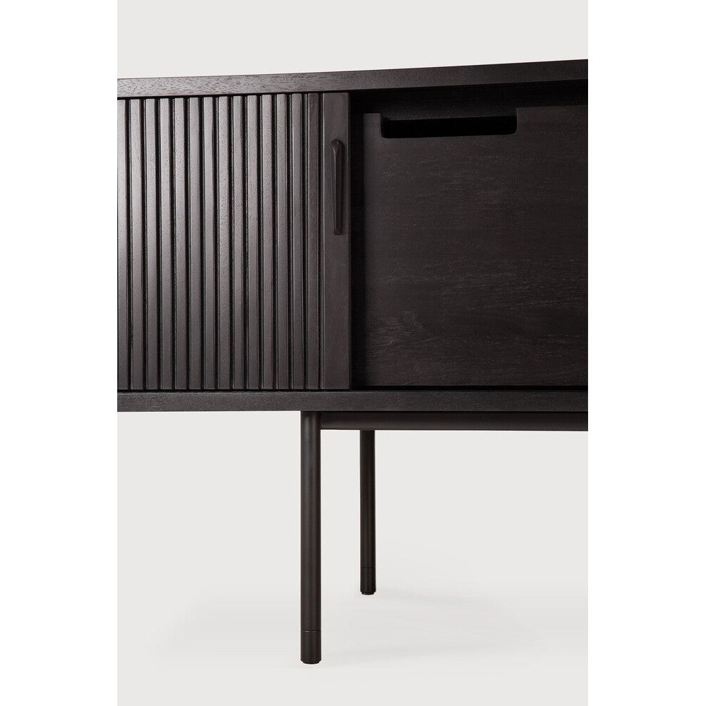 Featuring Roller Max TV Cupboard Teak black by Ethnicraft at Amethyst Home. The Roller Max collection is remarkable in its design, distinguished with its stacked wood-stick effect. The TV cupboard offers functional storage in an eye-catching design, resulting in an elegant and sophisticated item for both residential and commercial spaces.
Overall Dimensions:. Amethyst Home provides interior design, new home construction design consulting, vintage area rugs, and lighting in the Monterey metro area.