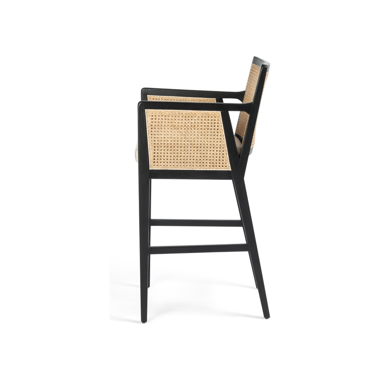 Featuring Antonia Cane Brushed Ebony Bar Stool by Four Hands at Amethyst Home. We love the retro look the cane brings to this Antonia Brushed Ebony Cane Bar Stool. A stunning piece to complete a retro aesthetic in any kitchen or bar area. 
Size: 22"W x 22.50"L x 43"HArm Height from Floor: 37.40" Arm Height from Seat: 6.10" Arm Length: 18.90" Arm Width:.  Amethyst Home provides interior design, new home construction design consulting, vintage area rugs, and lighting in the Newport Beach metro area.