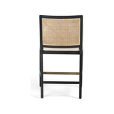 Featuring Antonia Cane Brushed Ebony Bar Stool by Four Hands at Amethyst Home. We love the retro look the cane brings to this Antonia Brushed Ebony Cane Bar Stool. A stunning piece to complete a retro aesthetic in any kitchen or bar area. 
Size: 22"W x 22.50"L x 43"HArm Height from Floor: 37.40" Arm Height from Seat: 6.10" Arm Length: 18.90" Arm Width: 1..  Amethyst Home provides interior design, new home construction design consulting, vintage area rugs, and lighting in the Scottsdale metro area.