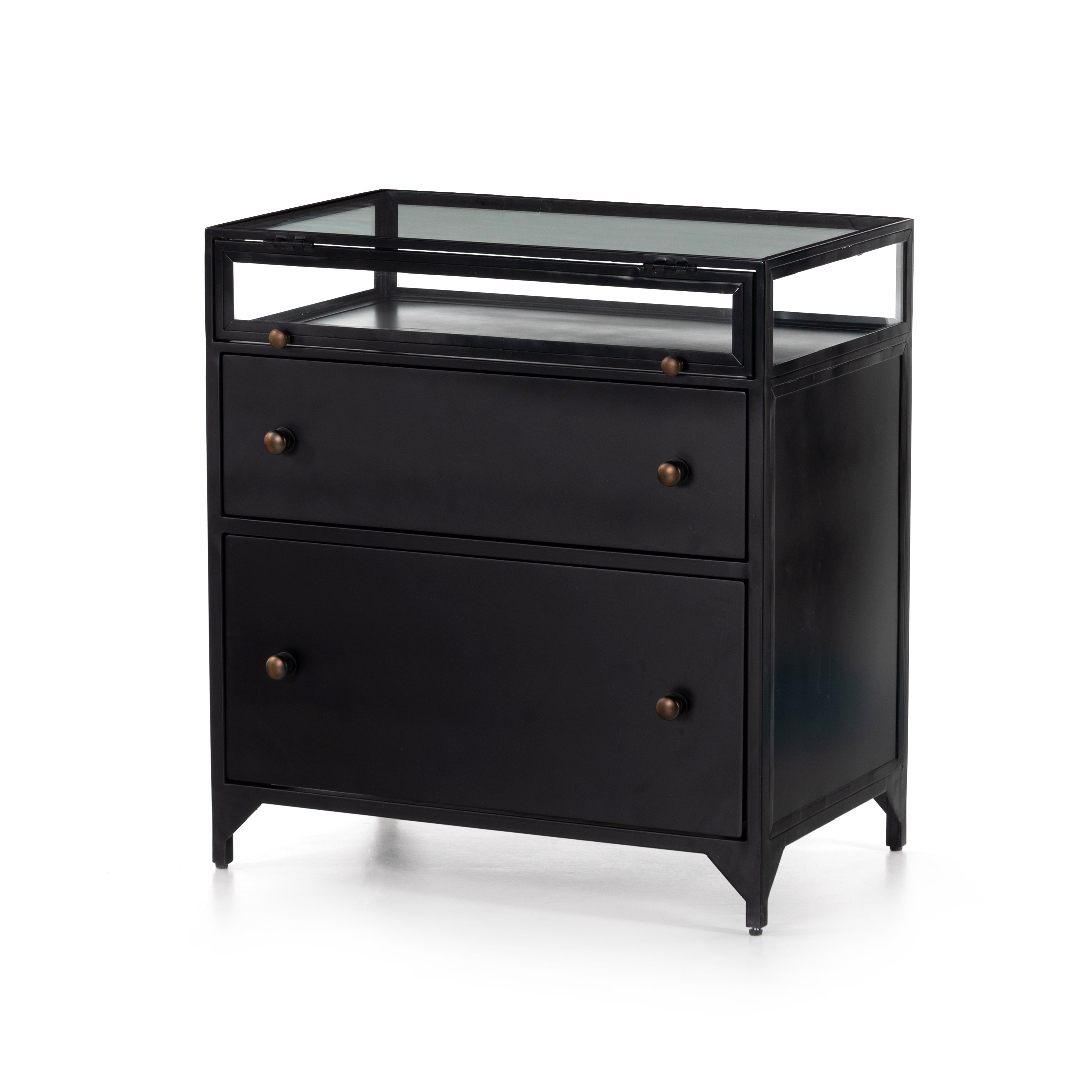 Featuring Shadow Box Nightstand by Four Hands at Amethyst Home. This Shadow Box Nightstand is finished in a gorgeous matte black. We love that the glass top allows you to showcase your favorite jewelry or family keepsake, while the two spacious drawers give you storage space. The knobs are finished in bronze to give this piece a sleek contrast. 
Overa.  Amethyst Home provides interior design, new home construction design consulting, vintage area rugs, and lighting in the Salt Lake City metro area.