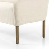 Featuring Addington Brussels Natural Slipcover Bench by Four Hands at Amethyst Home. Introducing a sustainable take on slipcovered seating. A relaxed dining bench is upholstered in soft, sustainably made Belgian Linen™, with solid oak legs. Libeco™-sourced Belgian linens are 100% natural and free of toxic chemicals. Certified Oeko-Tex® STANDARD 100, s. Amethyst Home provides interior design, new home construction design consulting, vintage area rugs, and lighting in the Scottsdale metro area.