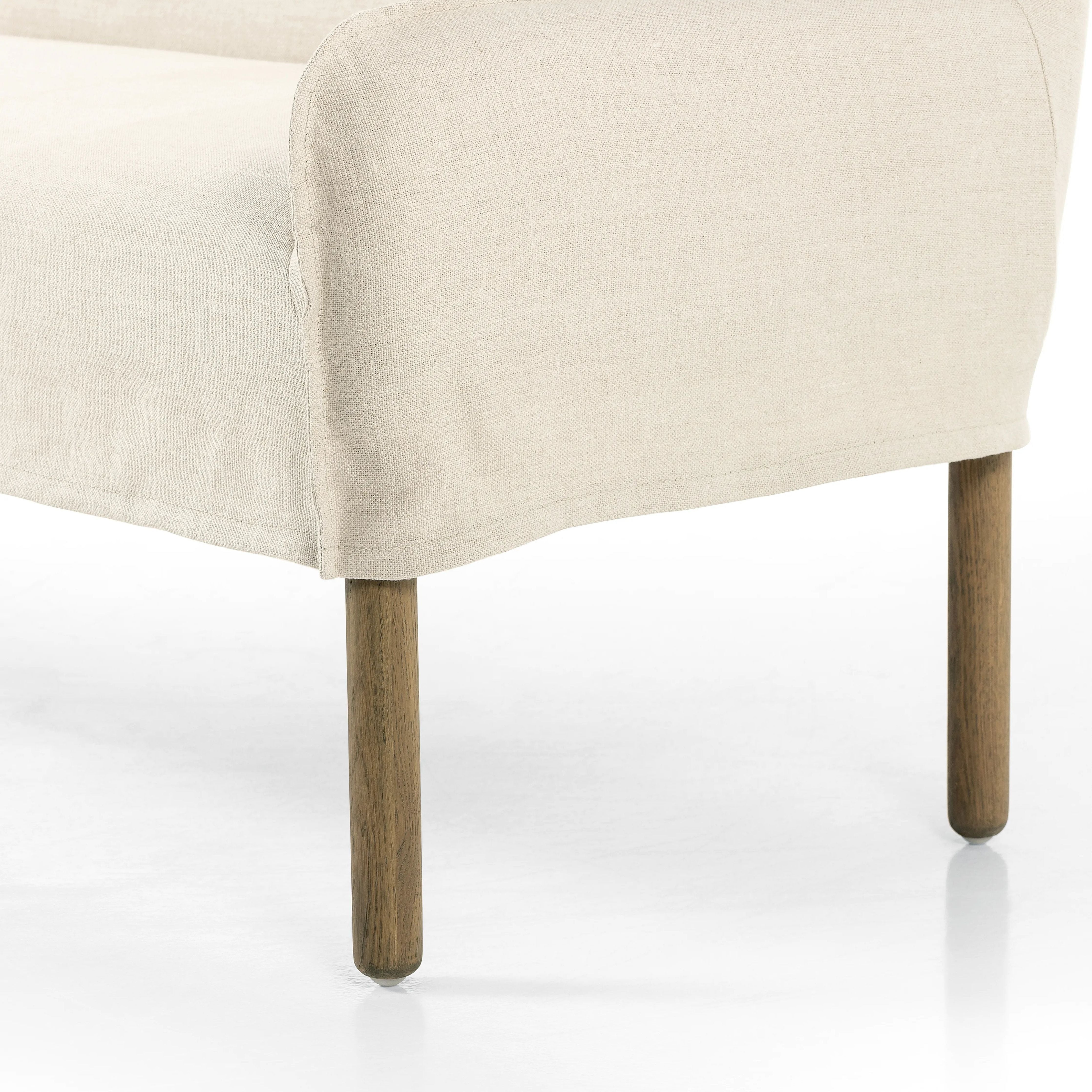 Featuring Addington Brussels Natural Slipcover Bench by Four Hands at Amethyst Home. Introducing a sustainable take on slipcovered seating. A relaxed dining bench is upholstered in soft, sustainably made Belgian Linen™, with solid oak legs. Libeco™-sourced Belgian linens are 100% natural and free of toxic chemicals. Certified Oeko-Tex® STANDARD 100, s. Amethyst Home provides interior design, new home construction design consulting, vintage area rugs, and lighting in the Scottsdale metro area.