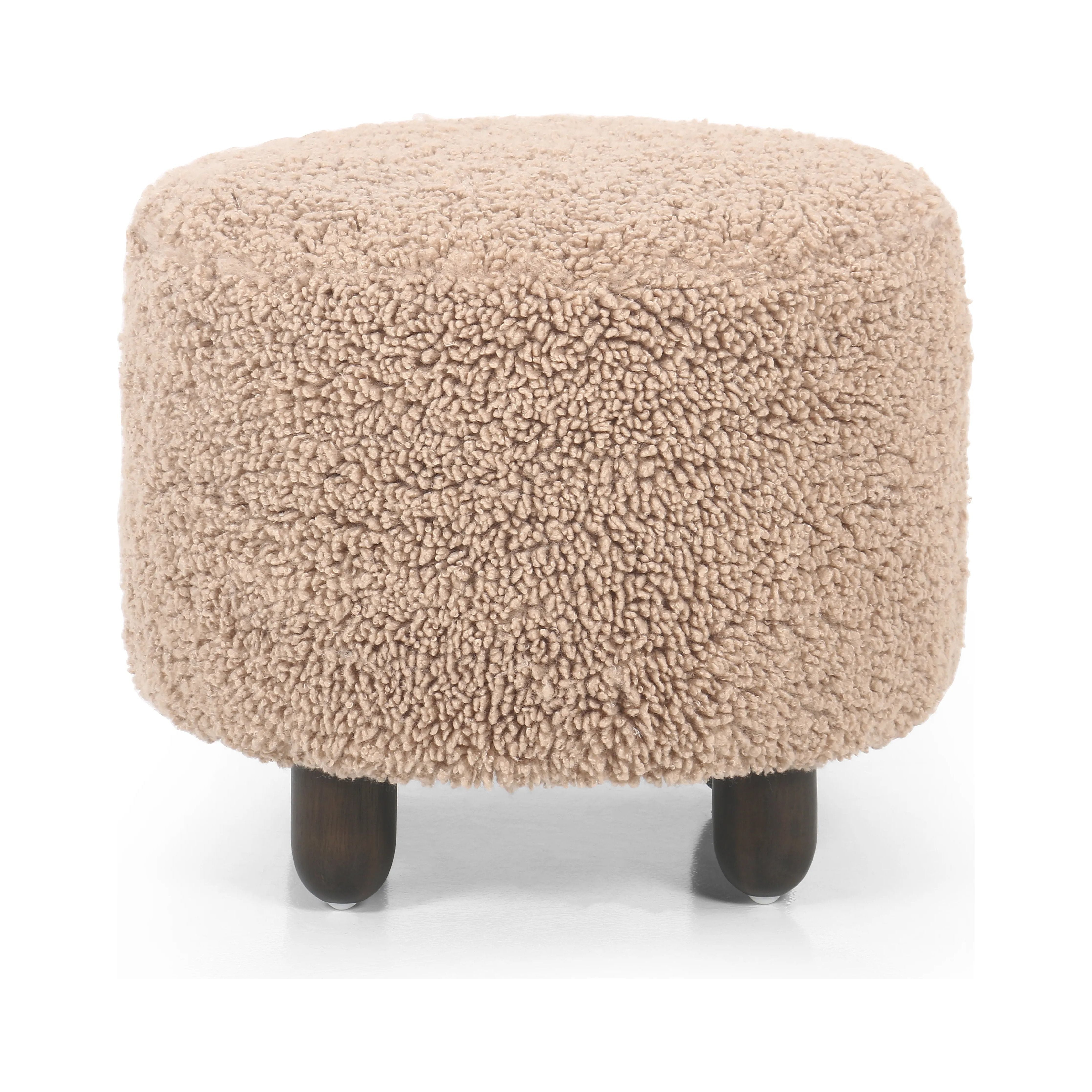 Featuring Aniston Andes Toast Ottoman by Four Hands at Amethyst Home. Place this round ottoman just about anywhere. Upholstered in a faux Mongolian shearling with a high pile fur in a toasty tan neutral hue. Burnt birch parawood legs add a touch of contrast.Overall Dimensions: 22.5"W x 22.5"L x 20.5"H
Collection: KensingtonColors: Andes Toast ,Burnt BirchMater. Amethyst Home provides interior design, new home construction design consulting, vintage area rugs, and lighting in the Boston metro area.