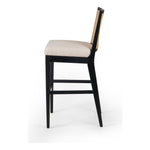 Featuring Antonia  Armless Dining Stool Stool by Four Hands at Amethyst Home. Light-toasted parawood frames a textural inlay of natural cane for a clean, monochromatic look, with seating of performance fabric for smart sensibility. Perfectly sized for the counter, with a brass kick plate for comfort and contrast. Performance fabrics are specially created to withstand spills, stains,. Amethyst Home provides interior design, new construction, custom furniture, and area rugs in the Dallas metro area.