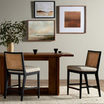 Featuring Antonia  Armless Dining Stool Stool by Four Hands at Amethyst Home. Light-toasted parawood frames a textural inlay of natural cane for a clean, monochromatic look, with seating of performance fabric for smart sensibility. Perfectly sized for the counter, with a brass kick plate for comfort and contrast. Performance fabrics are specially created to withstand spills, sta. Amethyst Home provides interior design, new construction, custom furniture, and area rugs in the Des Moines metro area.