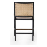 Featuring Antonia  Armless Dining Stool Stool by Four Hands at Amethyst Home. Light-toasted parawood frames a textural inlay of natural cane for a clean, monochromatic look, with seating of performance fabric for smart sensibility. Perfectly sized for the counter, with a brass kick plate for comfort and contrast. Performance fabrics are specially created to withstand spills, stains. Amethyst Home provides interior design, new construction, custom furniture, and area rugs in the Houston metro area.