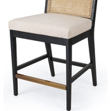 Featuring Antonia  Armless Dining Stool Stool by Four Hands at Amethyst Home. Light-toasted parawood frames a textural inlay of natural cane for a clean, monochromatic look, with seating of performance fabric for smart sensibility. Perfectly sized for the counter, with a brass kick plate for comfort and contrast. Performance fabrics are specially created to withstand spills, s. Amethyst Home provides interior design, new construction, custom furniture, and area rugs in the Laguna Beach metro area.