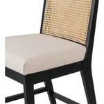 Featuring Antonia  Armless Dining Stool Stool by Four Hands at Amethyst Home. Light-toasted parawood frames a textural inlay of natural cane for a clean, monochromatic look, with seating of performance fabric for smart sensibility. Perfectly sized for the counter, with a brass kick plate for comfort and contrast. Performance fabrics are specially created to withstand spills, stain. Amethyst Home provides interior design, new construction, custom furniture, and area rugs in the Monterey metro area.