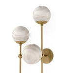 Featuring Armstrong Burnished Brass Marbled Matte Glass 4 L Sconce by Four Hands at Amethyst Home. Marbled glass spheres seem to extend and reach across smooth brass rods. Each globe is individually blown, shaped and sculpted by hand through a one-hour process. Brass and glass are 98% recyclable. Designed and sustainably made in Poland by Schwung.
Over. Amethyst Home provides interior design, new home construction design consulting, vintage area rugs, and lighting in the Salt Lake City metro area.