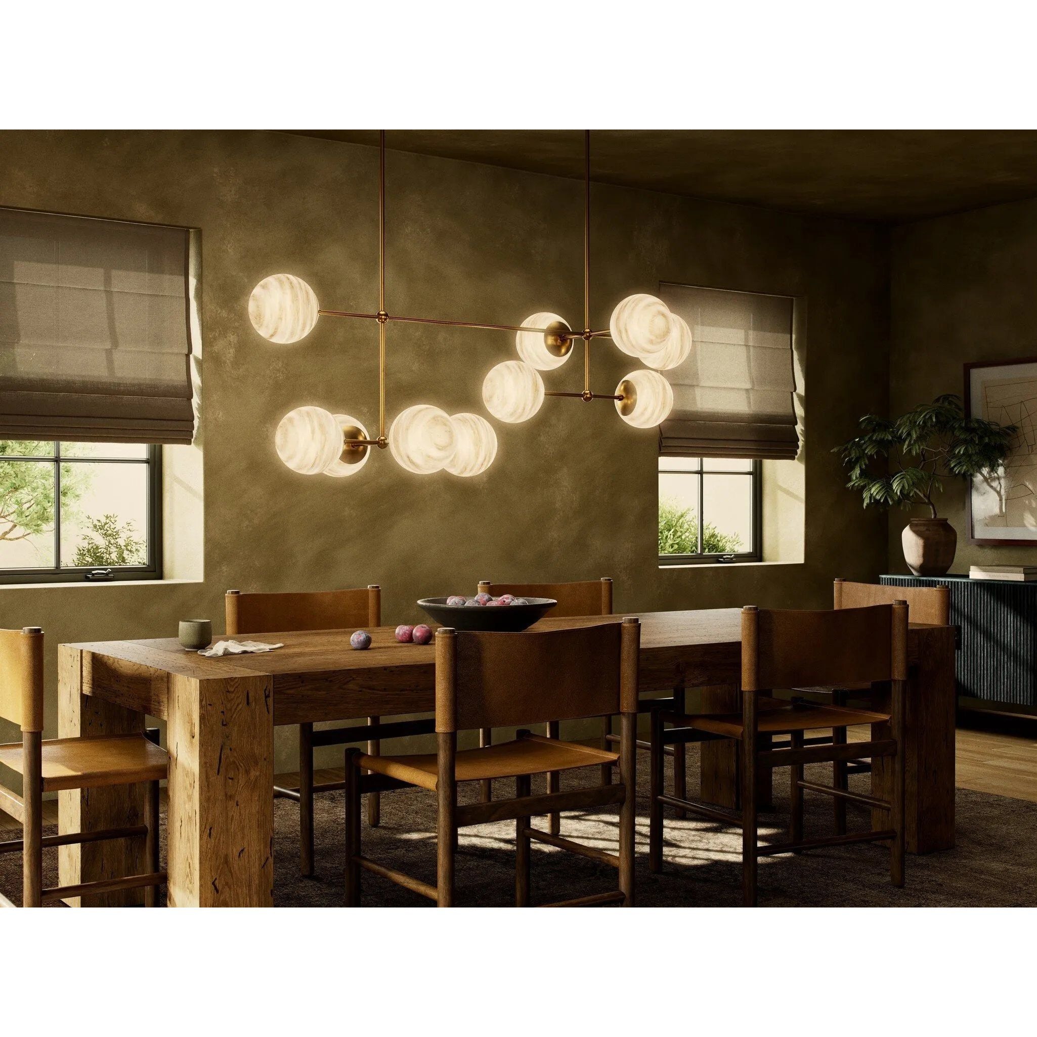 Featuring Armstrong Burnished Brass Marbled Matte Glass Linear Chandelier by Four Hands at Amethyst Home. Marbled glass spheres seem to extend and reach across smooth brass rods. Each globe is individually blown, shaped and sculpted by hand through a one-hour process. Brass and glass are 98% recyclable. Designed and sustainably made in Poland by Schwung.
O. Amethyst Home provides interior design, new home construction design consulting, vintage area rugs, and lighting in the Alpharetta metro area.
