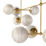 Featuring Armstrong Burnished Brass Marbled Matte Glass Linear Chandelier by Four Hands at Amethyst Home. Marbled glass spheres seem to extend and reach across smooth brass rods. Each globe is individually blown, shaped and sculpted by hand through a one-hour process. Brass and glass are 98% recyclable. Designed and sustainably made in Poland by Schwung.
Ove. Amethyst Home provides interior design, new home construction design consulting, vintage area rugs, and lighting in the Portland metro area.