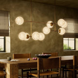 Featuring Armstrong Burnished Brass Marbled Matte Glass Linear Chandelier by Four Hands at Amethyst Home. Marbled glass spheres seem to extend and reach across smooth brass rods. Each globe is individually blown, shaped and sculpted by hand through a one-hour process. Brass and glass are 98% recyclable. Designed and sustainably made in Poland by Schwung.
Overal. Amethyst Home provides interior design, new home construction design consulting, vintage area rugs, and lighting in the Tampa metro area.