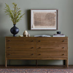 Featuring Arturo Natural Walnut 6 Drawer Dresser by Four Hands at Amethyst Home. Inspired by campaign-style furniture of the 1800s — packable pieces first designed for traveling military use — a simply shaped dresser of natural walnut features a subtly inset top and rounded legs, finished with wooden hardware.
Collection: WallisColors: Natural Waln. Amethyst Home provides interior design, new home construction design consulting, vintage area rugs, and lighting in the Salt Lake City metro area.