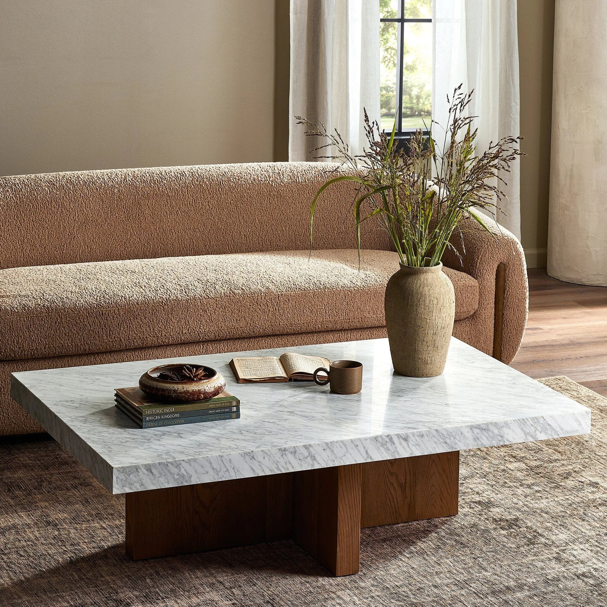 Featuring Bellamy White Carrera Marble Rectangular Coffee Table by Four Hands at Amethyst Home. Structured lines and wide proportions fuse for a mixed material coffee table of smoked oak and polished marble.Collection: HughesColors: White Carrera Marble ,Smoked Oak VeneerMaterials: Carrara Solid ,Thick Oak Veneer ,Poplar Plywood Weight: 207.23 lbs. Amethyst Home provides interior design, new home construction design consulting, vintage area rugs, and lighting in the Salt Lake City metro area.