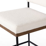 Featuring Benton Fayette Cloud Stool by Four Hands at Amethyst Home. Bring a crisp, clean look to the counter. Slim, black-finished iron forms an airy frame for pristinely tailored performance fabric, with solid oak decking for an eye-catching material mix. Performance fabrics are specially created to withstand spills, stains, high traffic and wear, ensuring long-term comfort and u. Amethyst Home provides interior design, new construction, custom furniture, and area rugs in the Seattle metro area.