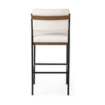 Featuring Benton Fayette Cloud Stool by Four Hands at Amethyst Home. Bring a crisp, clean look to the counter. Slim, black-finished iron forms an airy frame for pristinely tailored performance fabric, with solid oak decking for an eye-catching material mix. Performance fabrics are specially created to withstand spills, stains, high traffic and wear, ensuring long-term comfort and unm. Amethyst Home provides interior design, new construction, custom furniture, and area rugs in the Tampa metro area.