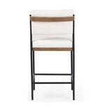 Featuring Benton Fayette Cloud Stool by Four Hands at Amethyst Home. Bring a crisp, clean look to the counter. Slim, black-finished iron forms an airy frame for pristinely tailored performance fabric, with solid oak decking for an eye-catching material mix. Performance fabrics are specially created to withstand spills, stains, high traffic and wear, ensuring long-term comfort. Amethyst Home provides interior design, new construction, custom furniture, and area rugs in the Winter Garden metro area.