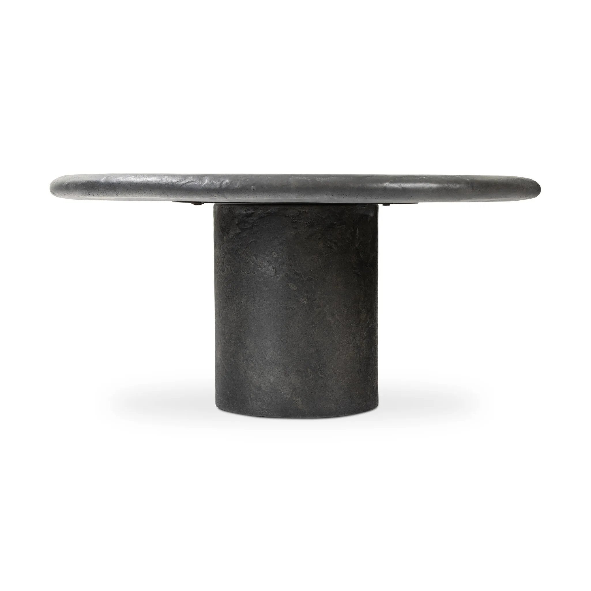 Featuring Bonnie Textured Black Concrete Coffee Table by Four Hands at Amethyst Home. A cylindrical pedestal base delivers a touch of softness to a a heavily textured tabletop of slate-like concrete.Collection: ChandlerColors: Textured Black ConcreteMaterials: Concrete Weight: 72.75 lbs. Amethyst Home provides interior design, new home construction design consulting, vintage area rugs, and lighting in the Washington metro area.