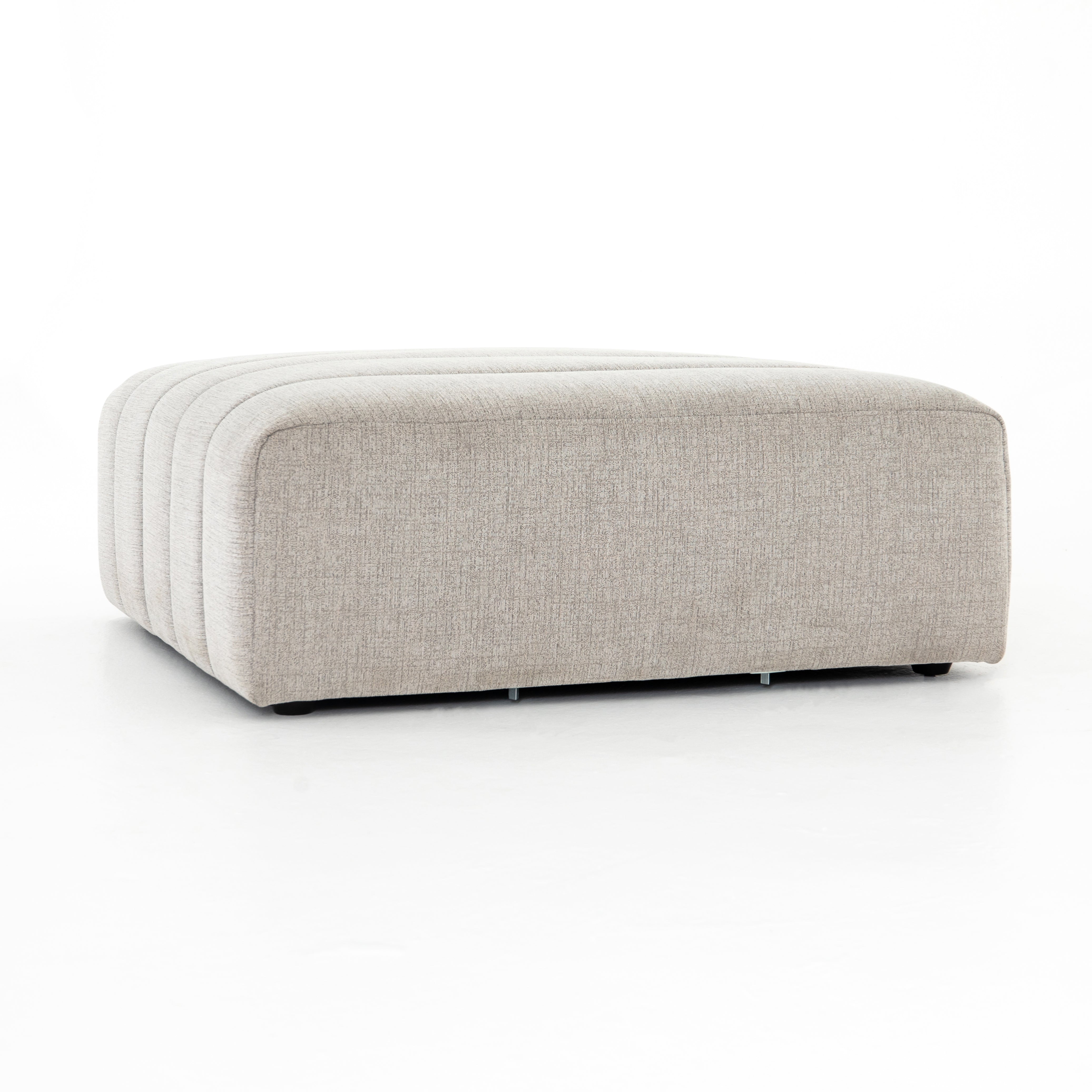 Featuring Langham Napa Sandstone Ottoman by Four Hands at Amethyst Home. Wide, vertical channels and low styling speaks to modish Italian influence. Sandstone-colored covering and modular components allow for versatility in any space. Ottoman to matching sectional. Performance fabrics are specially created to withstand spills, stains, high traffic and wear, ens. Amethyst Home provides interior design, new home construction design consulting, vintage area rugs, and lighting in the Tampa metro area.