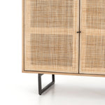 Featuring Carmel Natural Mango Small Cabinet by Four Hands at Amethyst Home. Mid-century style with an organic twist. Surrounded by mango casing, light cane weaves for a fresh look with natural depth. Angular gunmetal-finished iron legs offer an intriguing contrast of texture and tone. Perfect solo or paired up.Overall Dimensions: 35"W x 18"L x 32"HColors: Natural Cane, Natural Mango, Charcoa. Amethyst Home provides interior design services, furniture, rugs, and lighting in the Seattle metro area.