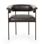 Featuring Carrie Sonoma Black Dining Chair by Four Hands at Amethyst Home. Airy and light with slim, black-finished iron framing, slate-colored performance boucle lends texture to a beautifully sculpted dining style featuring a yoke back and exterior fold detailing. Easy to clean and made from fully recyclable materials, Fiqa fabrics are machine-washable, stai. Amethyst Home provides interior design, new home construction design consulting, vintage area rugs, and lighting in the Austin metro area.