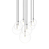 Featuring Cluster Black Cord 7 MIX Black Gunmetal Chandelier by Four Hands at Amethyst Home. Clear glass spheres dangle at varying lengths for a stunning effect. Each globe is individually blown, shaped and sculpted by hand through a one-hour process. The finish on the brass frame is achieved through a specialized process that turns the brass into an almost bla. Amethyst Home provides interior design, new home construction design consulting, vintage area rugs, and lighting in the Miami metro area.