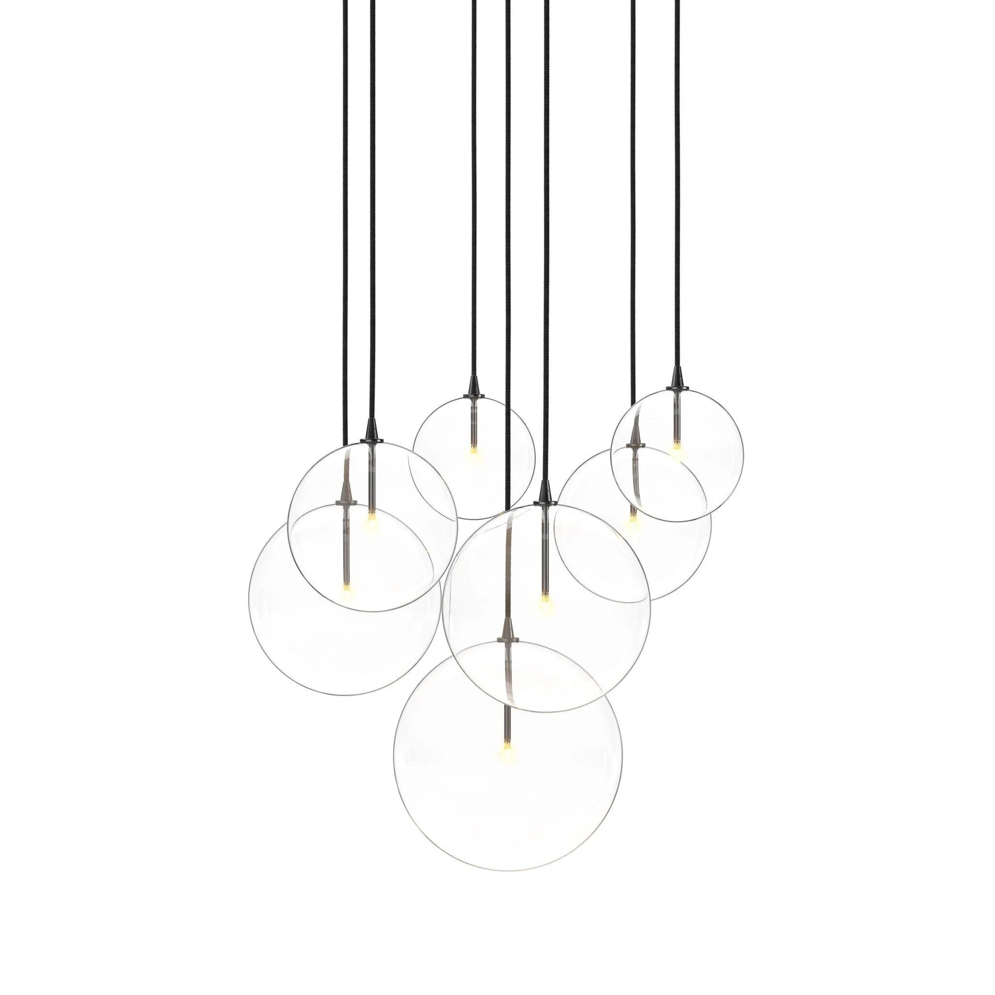 Featuring Cluster Black Cord 7 MIX Black Gunmetal Chandelier by Four Hands at Amethyst Home. Clear glass spheres dangle at varying lengths for a stunning effect. Each globe is individually blown, shaped and sculpted by hand through a one-hour process. The finish on the brass frame is achieved through a specialized process that turns the brass into an almost bla. Amethyst Home provides interior design, new home construction design consulting, vintage area rugs, and lighting in the Miami metro area.