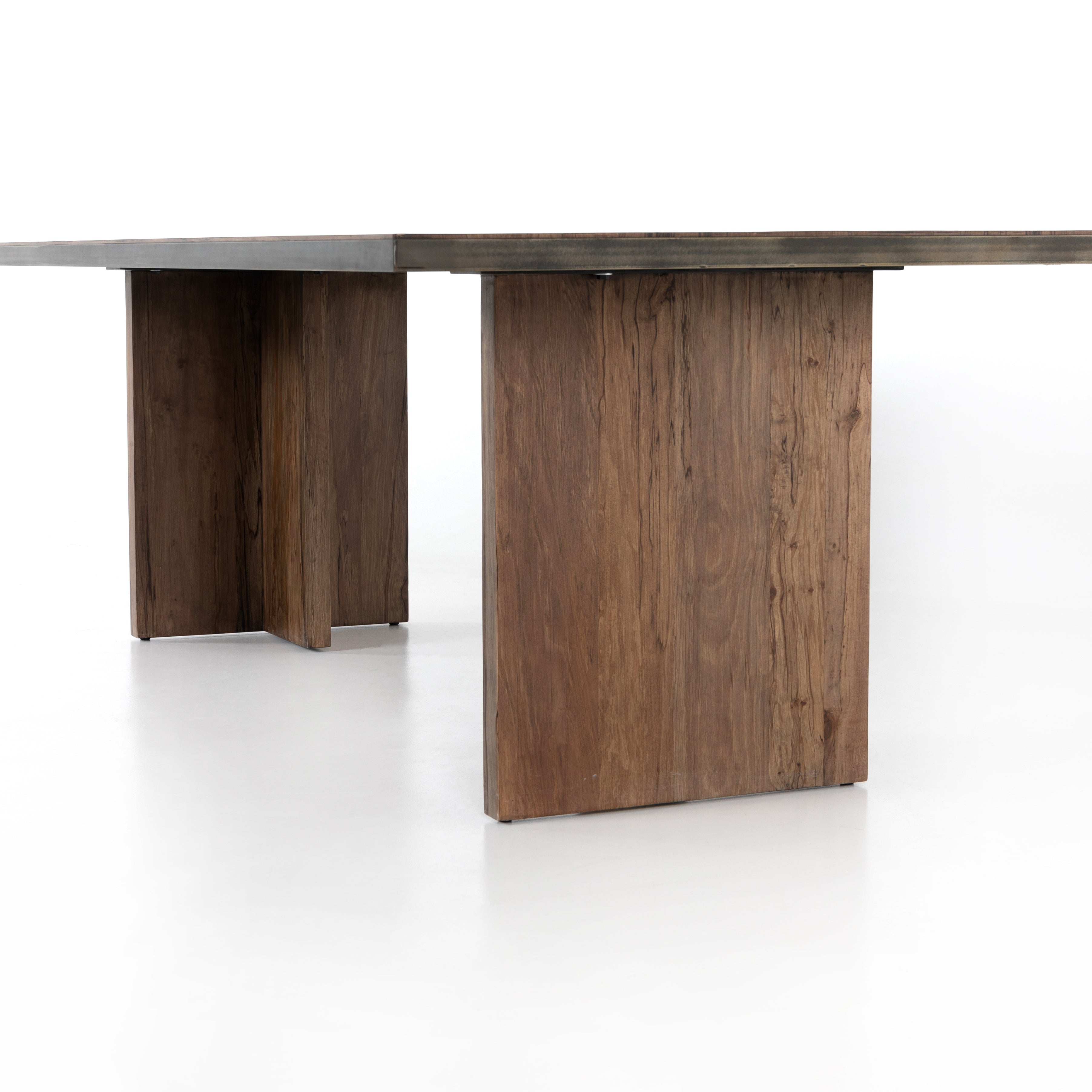Featuring Cross Spalted Alder Dining Table by Four Hands at Amethyst Home. The Cross Spalted Alder Dining Table features an iron strapping with a brushed gold finish adds a rustic, industrial edge to a substantial plank table. Beautiful graining marks simple, cross-shaped trestles and table top.
Overall Dimensions: 94"W x 42"L x 30"HColors: Dark Spalted Prima.  Amethyst Home provides interior design, new home construction design consulting, vintage area rugs, and lighting in the Austin metro area.