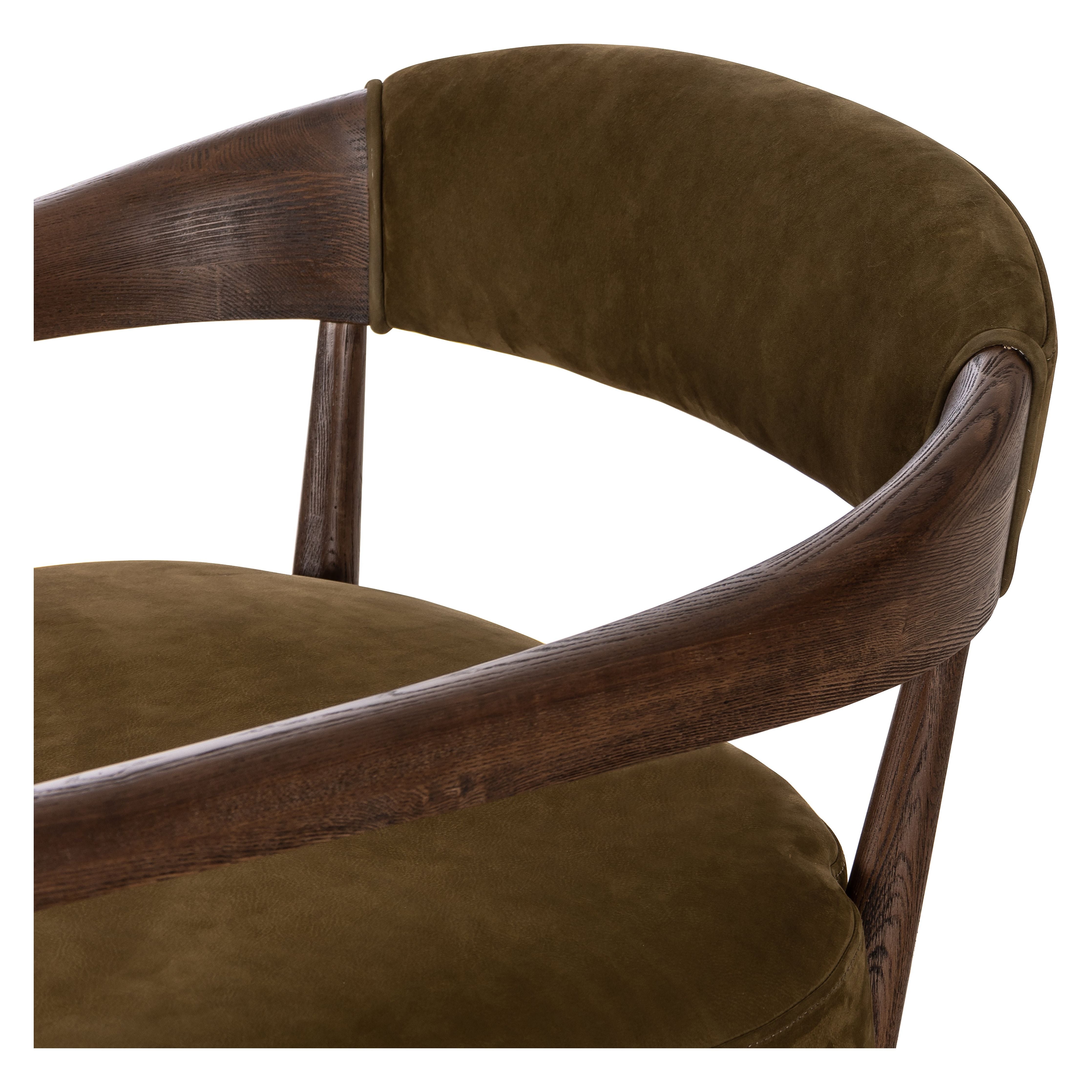 Featuring Dane Cottswald Moss Nubuck Chair by Four Hands at Amethyst Home. Safari styling is brought to modern speed on this vintage-inspired chair. Its solid wood frame features a webbed seating structure that brings a sink-in feel to the entire piece. The upholstered back, strap details and loose cushion are finished in a rich Italian-made leather with a soft, buttery feel and. Amethyst Home provides interior design, new construction, custom furniture, and area rugs in the Washington metro area.