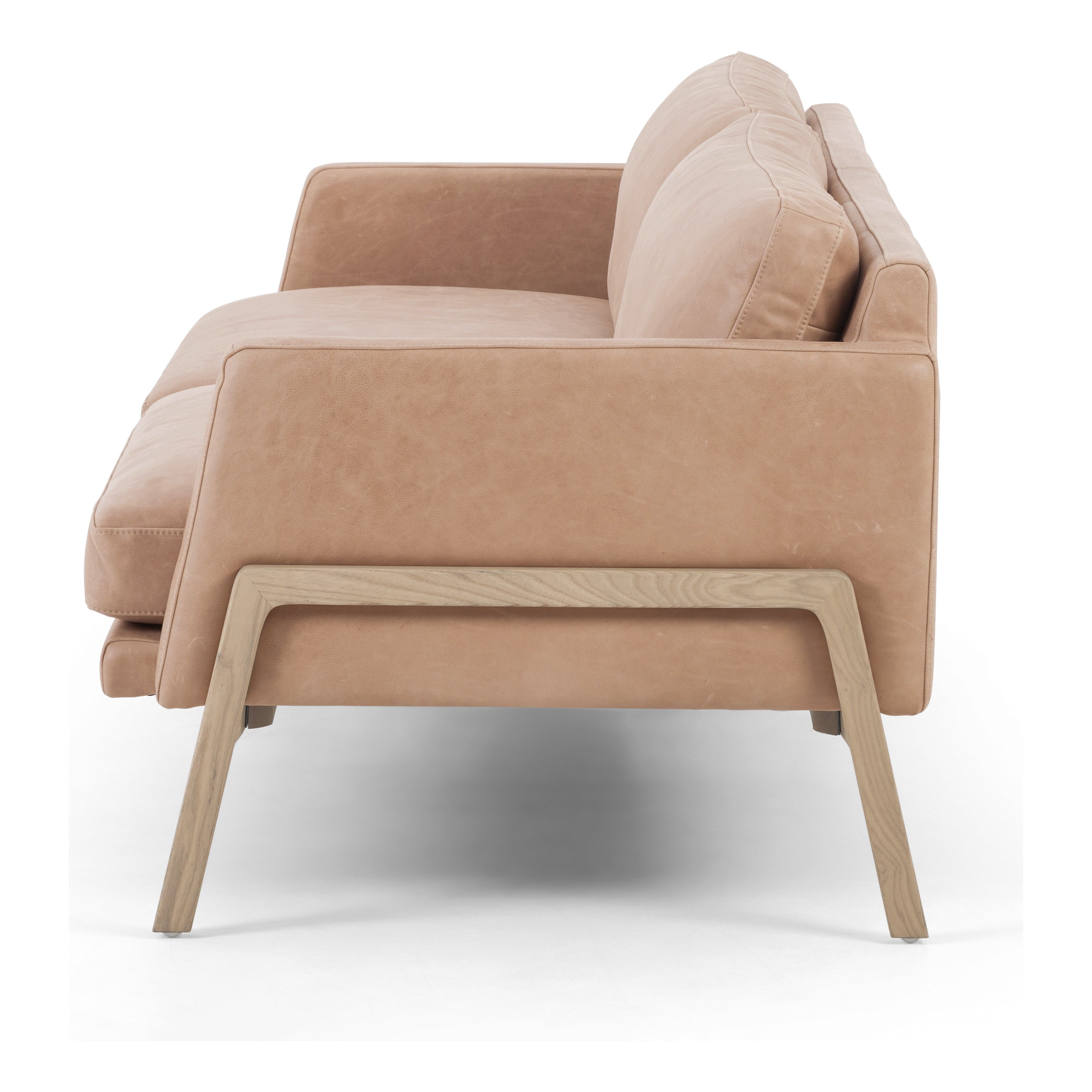 Featuring Diana Palermo Nude Sofa by Four Hands at Amethyst Home. Buttery leather in a chic palette, the Diana sofa is charming and ultra comfy.  The wooden frame detail is an extra special touch.
Collection: KensingtonColors: Palermo Nude ,Natural Whitewash AshMaterials: Top Grain Leather ,Solid AshOverall Dimensions: 84"W x 36"L x 32"H Weight: 134.5 lbsSeat Depth: 23.5" Seat Heig. Amethyst Home provides interior design, new construction, custom furniture, and area rugs in the Seattle metro area.