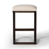 Featuring Finn Sienna Brown Oak Counter Stool by Four Hands at Amethyst Home. A stunner from every angle, this architecturally inspired stool features an angular base crafted from solid oak with two iron rods for added support and visual interest. Seat is upholstered in a linen/cotton/poly blend performance fabric with subtle texture throughout. Performanc. Amethyst Home provides interior design, new home construction design consulting, vintage area rugs, and lighting in the Scottsdale metro area.