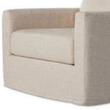 Featuring Hampton Creme Slipcover Swivel Chair by Four Hands at Amethyst Home. Proudly built by American makers using US-sourced materials and mechanisms. This classic swivel chair features clean track arms, a high, supportive back, feather filling and a 360-degree swivel. Upholstered with a fully removable slipcover of PFAS-free performance fabric that can b. Amethyst Home provides interior design, new home construction design consulting, vintage area rugs, and lighting in the Seattle metro area.