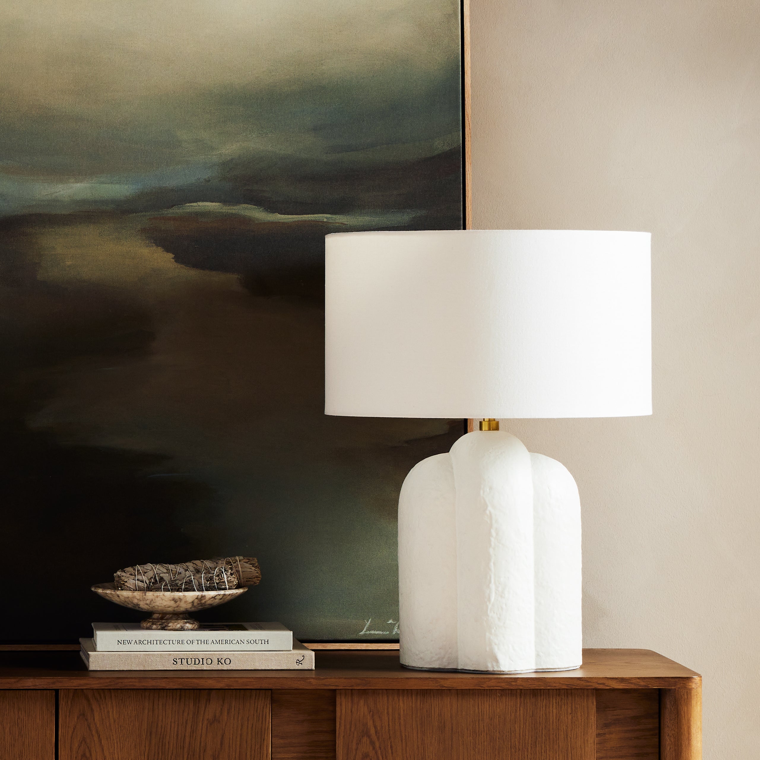 Featuring Yasmine Table Lamp by Four Hands at Amethyst Home. Gorgeous, glossy white concrete in a curvy base.  This lamp is an Amethyst fave.
Overall Dimensions: 20"W x 20"L x 27"H
Materials: Concrete, 100% Flax/Linen, Steel PlatingWeight: 23.37 lbBulb(s) Included: YesBulb Type: LedMax Wattage: 40. Amethyst Home provides interior design, new home construction design consulting, vintage area rugs, and lighting in the Newport Beach metro area.