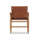 Featuring Lenz Sonoma Chestnut Dining Armchair by Four Hands at Amethyst Home. Inspired by a vintage safari-style frame, this dining chair is defined by the fluid strap arms. Semi-attached cushions in rich chestnut leather, finished with button tufting details. Parawood frame and brass details add warmth and texture.Overall Dimensions: 25"W x 23"L x 34"H
Colle. Amethyst Home provides interior design, new home construction design consulting, vintage area rugs, and lighting in the Boston metro area.