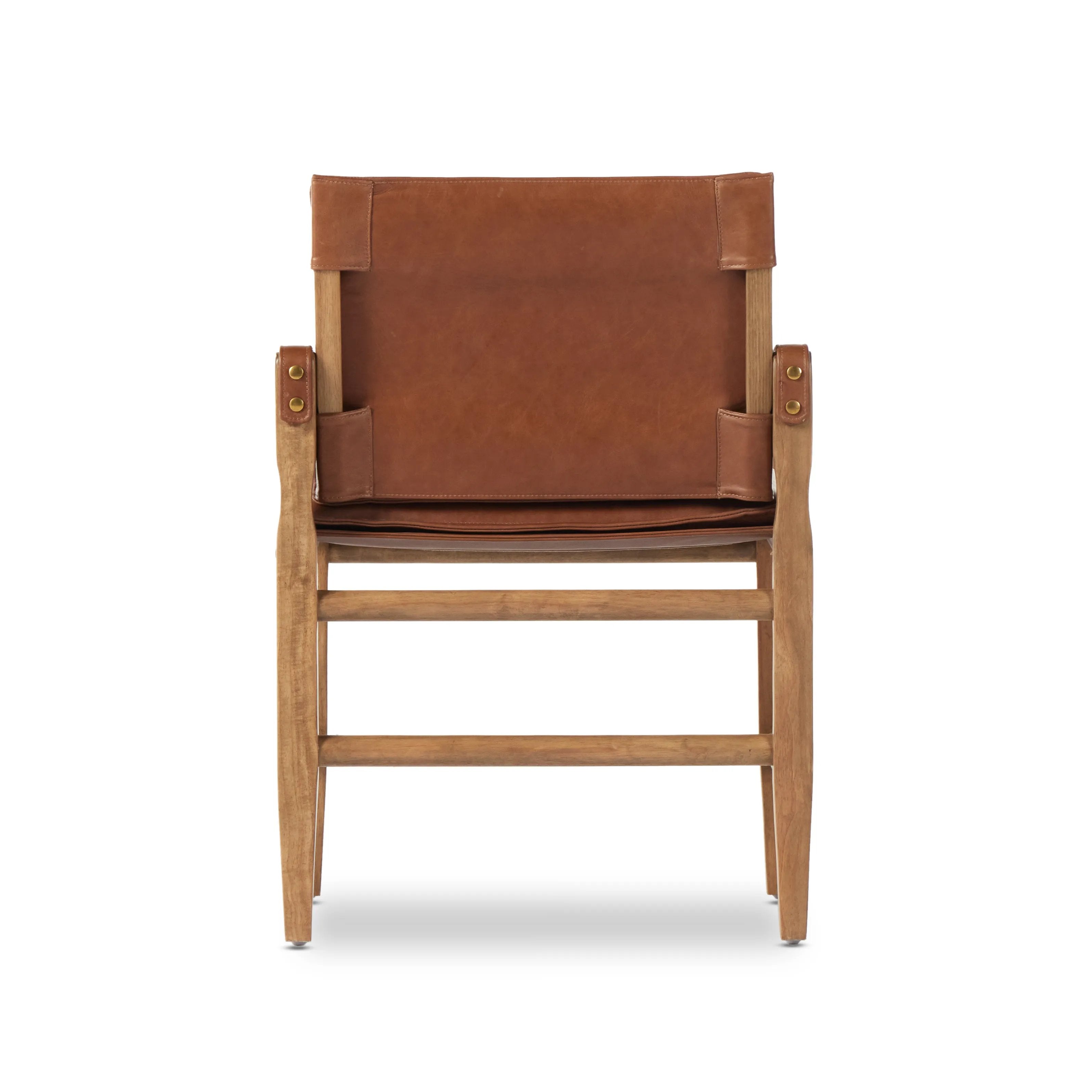 Featuring Lenz Sonoma Chestnut Dining Armchair by Four Hands at Amethyst Home. Inspired by a vintage safari-style frame, this dining chair is defined by the fluid strap arms. Semi-attached cushions in rich chestnut leather, finished with button tufting details. Parawood frame and brass details add warmth and texture.Overall Dimensions: 25"W x 23"L x 34"H
Colle. Amethyst Home provides interior design, new home construction design consulting, vintage area rugs, and lighting in the Boston metro area.