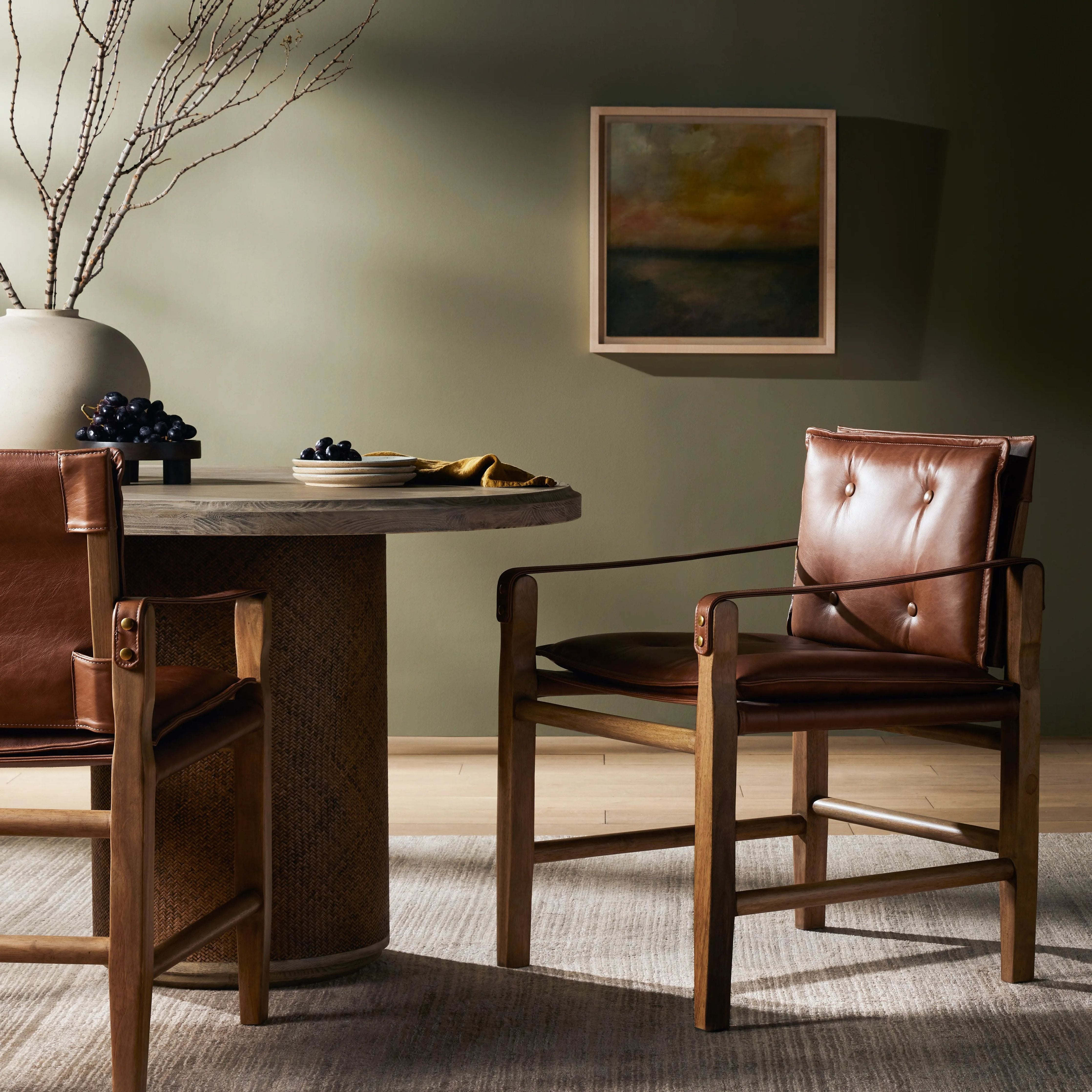 Featuring Lenz Sonoma Chestnut Dining Armchair by Four Hands at Amethyst Home. Inspired by a vintage safari-style frame, this dining chair is defined by the fluid strap arms. Semi-attached cushions in rich chestnut leather, finished with button tufting details. Parawood frame and brass details add warmth and texture.Overall Dimensions: 25"W x 23"L x 34"H
Colle. Amethyst Home provides interior design, new home construction design consulting, vintage area rugs, and lighting in the Dallas metro area.