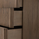 Featuring Leo Rustic Grey 6 Drawer Dresser by Four Hands at Amethyst Home. Designed by Thomas Bina and Ronald Sasson, a design partnership blending both modern minimalist and Brazilian influences. Crafted from solid oak, this clean-lined dresser features vertical reed detailing on the drawer fronts with wooden pull detailing on the outer edges. Drawers are fini. Amethyst Home provides interior design, new home construction design consulting, vintage area rugs, and lighting in the Tampa metro area.