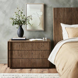 Featuring Leo Rustic Grey Nightstand by Four Hands at Amethyst Home. Designed by Thomas Bina and Ronald Sasson, a design partnership blending both modern minimalist and Brazilian influences. Crafted from solid oak, this clean-lined nightstand features vertical reed detailing on the drawer fronts with wooden pull detailing on the outer edges. Drawers are finishe. Amethyst Home provides interior design, new home construction design consulting, vintage area rugs, and lighting in the Tampa metro area.