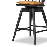 Featuring Lewis Black Counter Swivel Stool with Cushion by Four Hands at Amethyst Home. A new take on the traditional Windsor. This tall beauty is wire-brushed to highlight the cathedral grain of black oak. Perfectly sized for the counter, with a swivel for ease and a top-grain leather cushion for comfort.Overall Dimensions: 21.75"W x 21"L x 42"H
Collection: W. Amethyst Home provides interior design, new home construction design consulting, vintage area rugs, and lighting in the Dallas metro area.