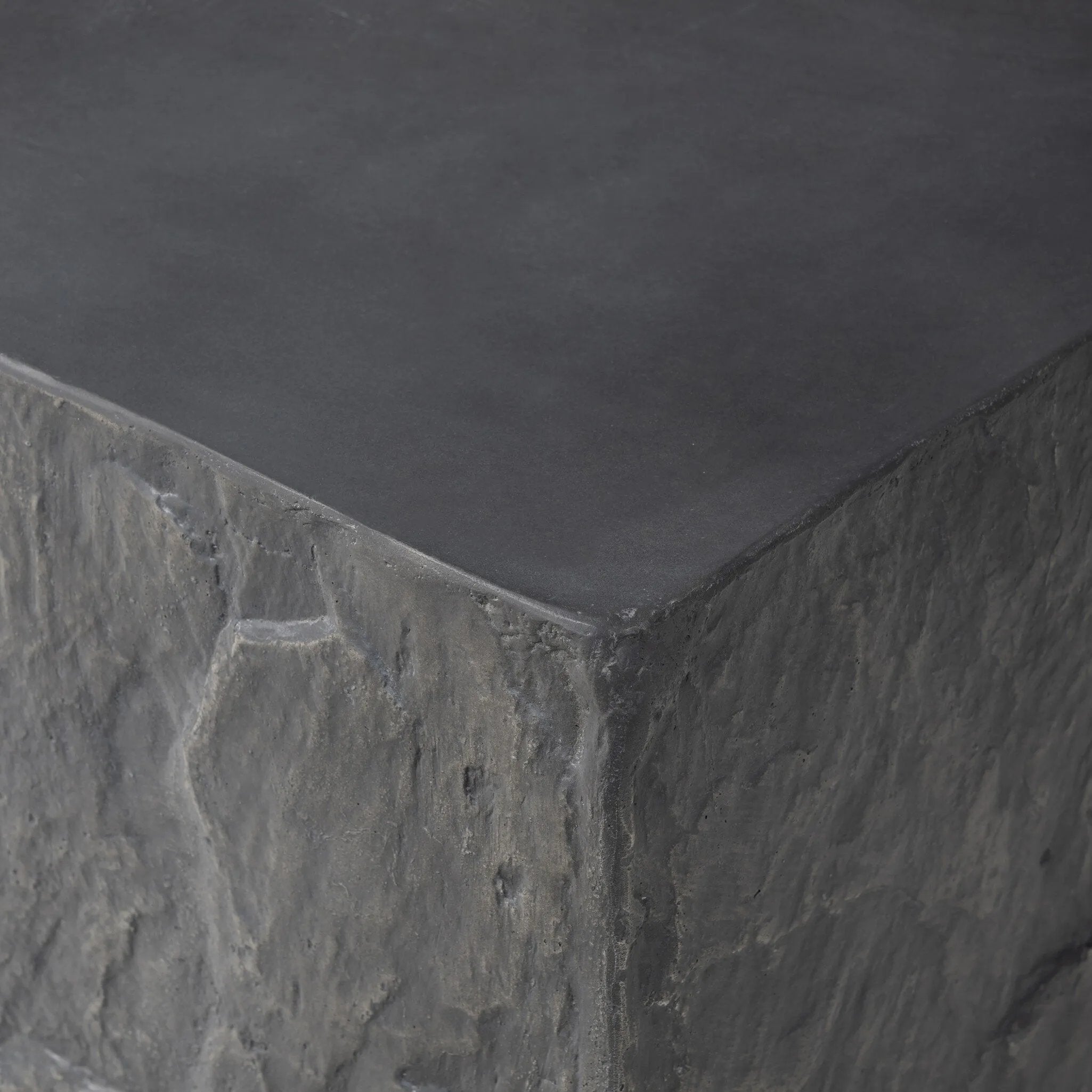 Featuring Lucius Smooth Black Concrete End Table by Four Hands at Amethyst Home. Cast black concrete features heavily textured sides that resemble natural slate, paired with a smoothed tabletop.Collection: ChandlerColors: Smooth Black Concrete ,Textured Black ConcreteMaterials: Concrete Weight: 52.91 lbs. Amethyst Home provides interior design, new home construction design consulting, vintage area rugs, and lighting in the Winter Garden metro area.