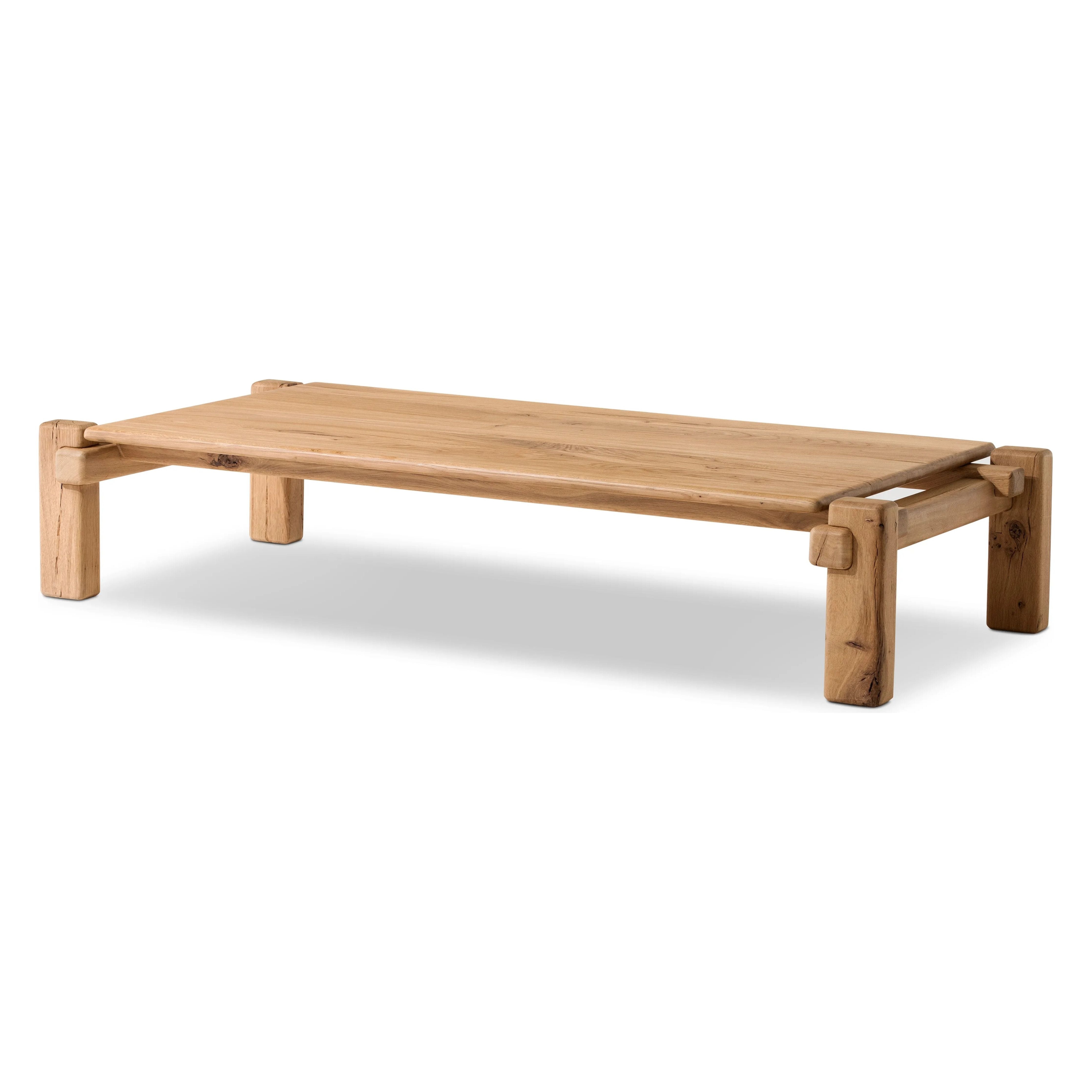 Featuring Marcia French Oak Large Coffee Table by Four Hands at Amethyst Home. Designed by Thomas Bina and Ronald Sasson, a design partnership blending both modern minimalist and Brazilian influences. Crafted from natural reclaimed French oak with overstated joint details. Rounded edges bring a soft, playful feel to the entire piece.Overall Dimensions: 31.5"W x. Amethyst Home provides interior design, new home construction design consulting, vintage area rugs, and lighting in the Omaha metro area.