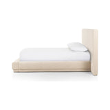 Featuring Martina Bergamo Extra Wide King Bed by Four Hands at Amethyst Home. Low profile luxury with an extra-wide fully upholstered headboard that brings drama to the bedroom. Modern Italian styling is both substantial and plush with clean lines all around. Fully upholstered in a textural cotton/linen blend with extra cushioning on the footboard and side . Amethyst Home provides interior design, new home construction design consulting, vintage area rugs, and lighting in the Calabasas metro area.