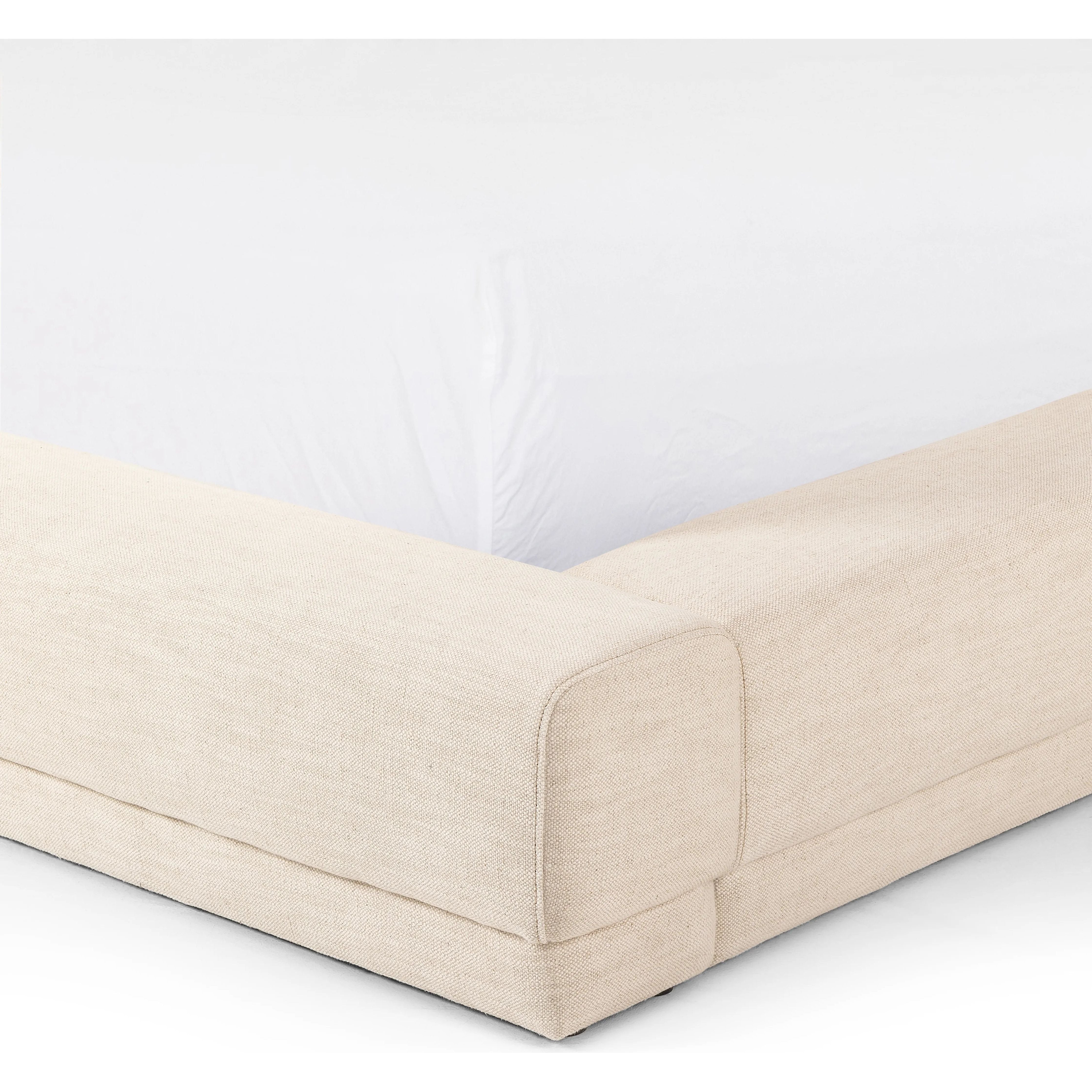 Featuring Martina Bergamo Extra Wide King Bed by Four Hands at Amethyst Home. Low profile luxury with an extra-wide fully upholstered headboard that brings drama to the bedroom. Modern Italian styling is both substantial and plush with clean lines all around. Fully upholstered in a textural cotton/linen blend with extra cushioning on the footboard and side . Amethyst Home provides interior design, new home construction design consulting, vintage area rugs, and lighting in the Charlotte metro area.