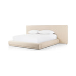 Featuring Martina Bergamo Extra Wide King Bed by Four Hands at Amethyst Home. Low profile luxury with an extra-wide fully upholstered headboard that brings drama to the bedroom. Modern Italian styling is both substantial and plush with clean lines all around. Fully upholstered in a textural cotton/linen blend with extra cushioning on the footboard and side rail. Amethyst Home provides interior design, new home construction design consulting, vintage area rugs, and lighting in the Tampa metro area.