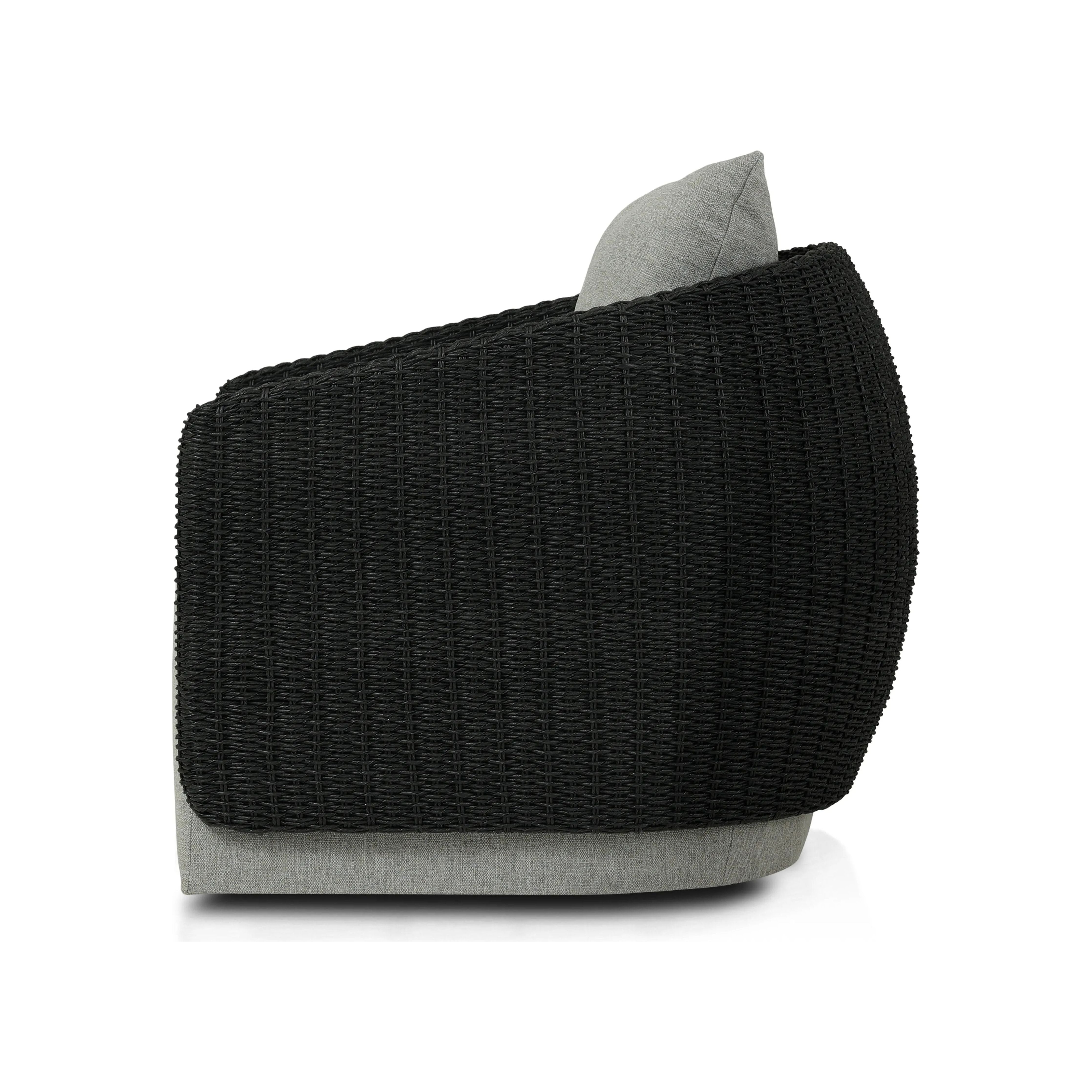 Featuring Maven Faux Black Outdoor Swivel Chair by Four Hands at Amethyst Home. Sustainably made with zero waste, luxurious Italian upholstery places a new and unique spin on indoor/outdoor seating, offering soft, durable fabric that's highly resistant to sun, stains, mold and abrasion. Shell framing in black faux-hyacinth weaves for extra texture atop . Amethyst Home provides interior design, new home construction design consulting, vintage area rugs, and lighting in the Winter Garden metro area.