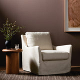 Featuring Monette Natural Slipcover Swivel Chair by Four Hands at Amethyst Home. This 360-degree swivel chair is defined by slightly sloping, flared arms and a floor-length slipcover. Finished in a soft, tight weave slipcover for a traditional style. Durable and soft to the touch, Libeco™-sourced linens are artisan-made and free of toxic chemicals. Slipcovered styles are fully . Amethyst Home provides interior design, new construction, custom furniture and area rugs in the Newport Beach metro area
